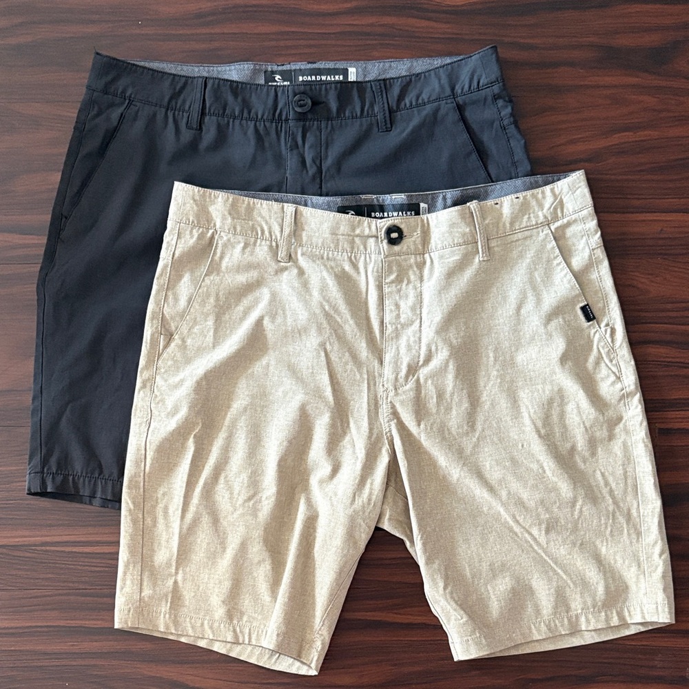 2 Rip curl Men's Black and Tan Shorts. Size 34